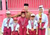 Keterbatasan Tak Menghalangi Prestasi, SDN 107 Danau Buluh Bersinar di Marching Band dan Karate